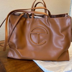 Great travel bag. Cognac color. Use it go shopping at the market or carry on.